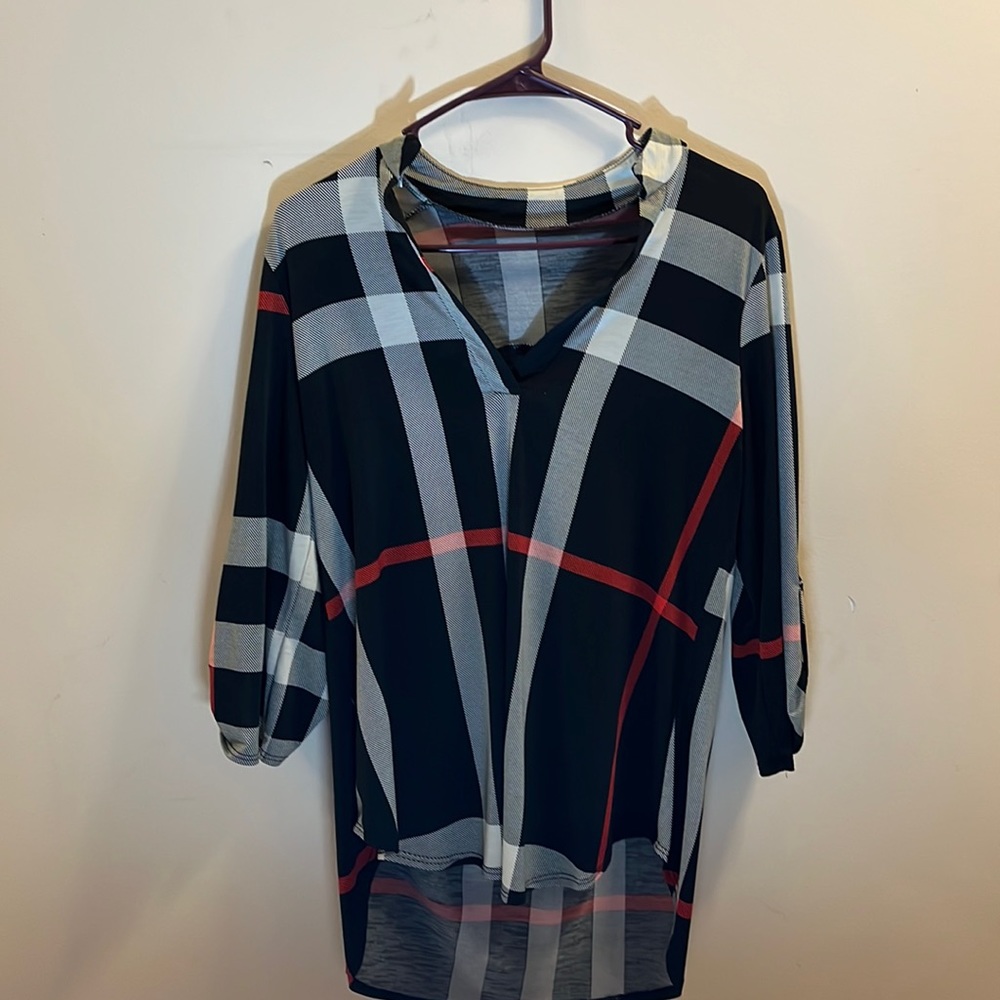 Flannel patterned dress shirt.
